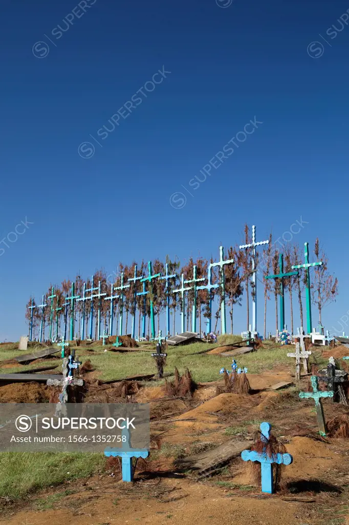 Mexico, Chiapas, El Romerillo, A series of tall crosses at the crest of the graveyard.