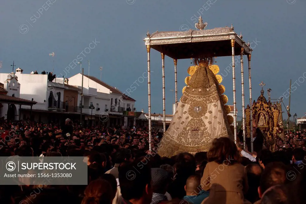 The image of Our Lady of El Rocio is carried in a procession in El Rocio village, in Almonte, Donana National Park, Huelva province, Andalusia, Spain,...