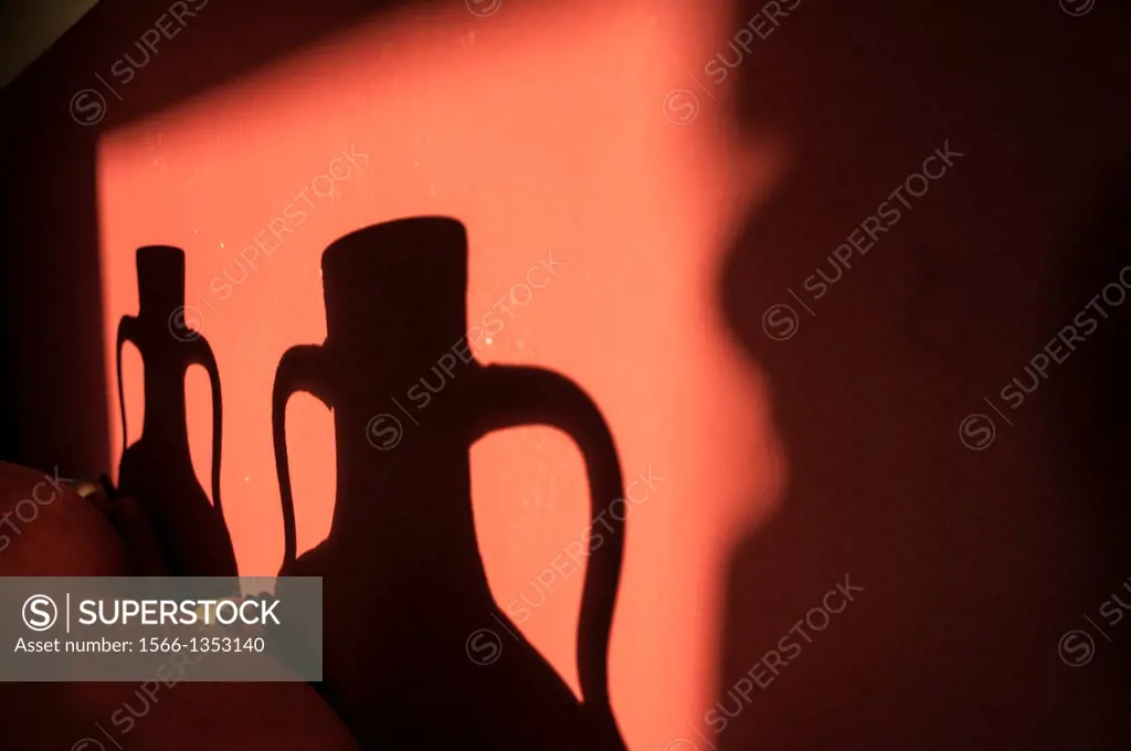 Shadows of a pitchers in a farmhouse, Navafría, Segovia Spain