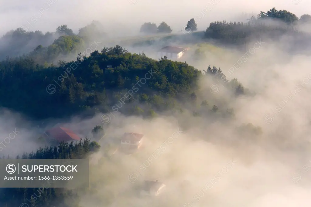 Fog. Basque Farmhouse. Aizkorri Aratz Natural Park. Aloña mount. Arantzazu. Oñati. Gipuzkoa. Basque Country. Spain.