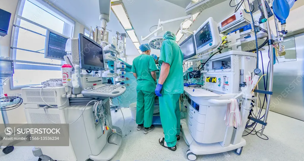 Surgeons-Heart valve replacement surgery, operating room, Reykjavik, Iceland.