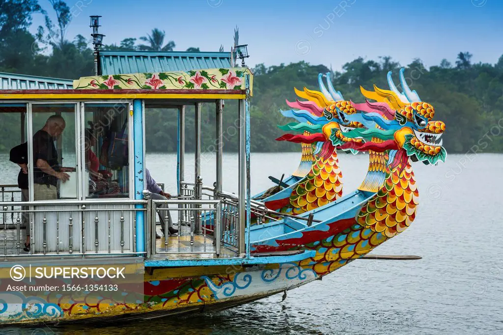 Tourboats with dragon heads along the Perfume River near Hue, Vietnam, Asia.