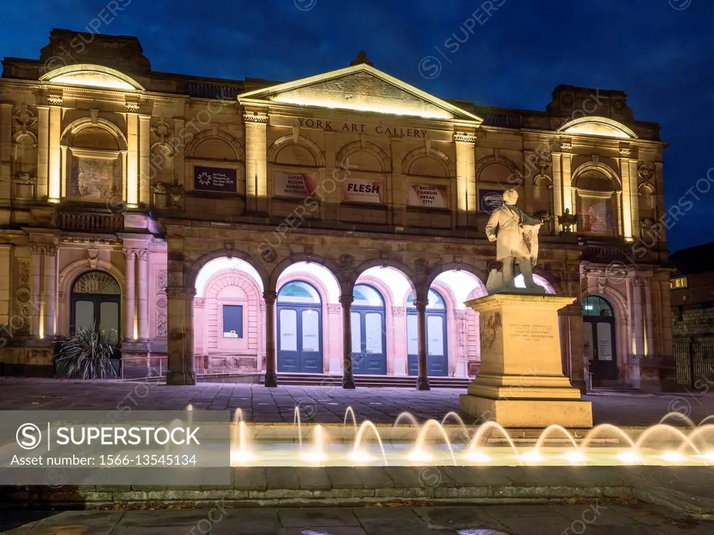 Floodlit Art Gallery and Fountain in Exhibition Square at Dusk in York Yorkshire England.