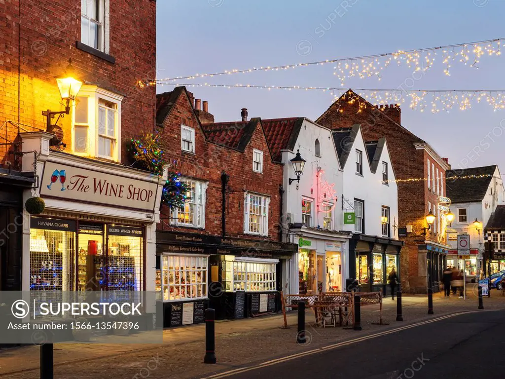 Market Square and Oldest Chemist Shop at Dusk at Christmas Knaresborough North Yorkshire England.
