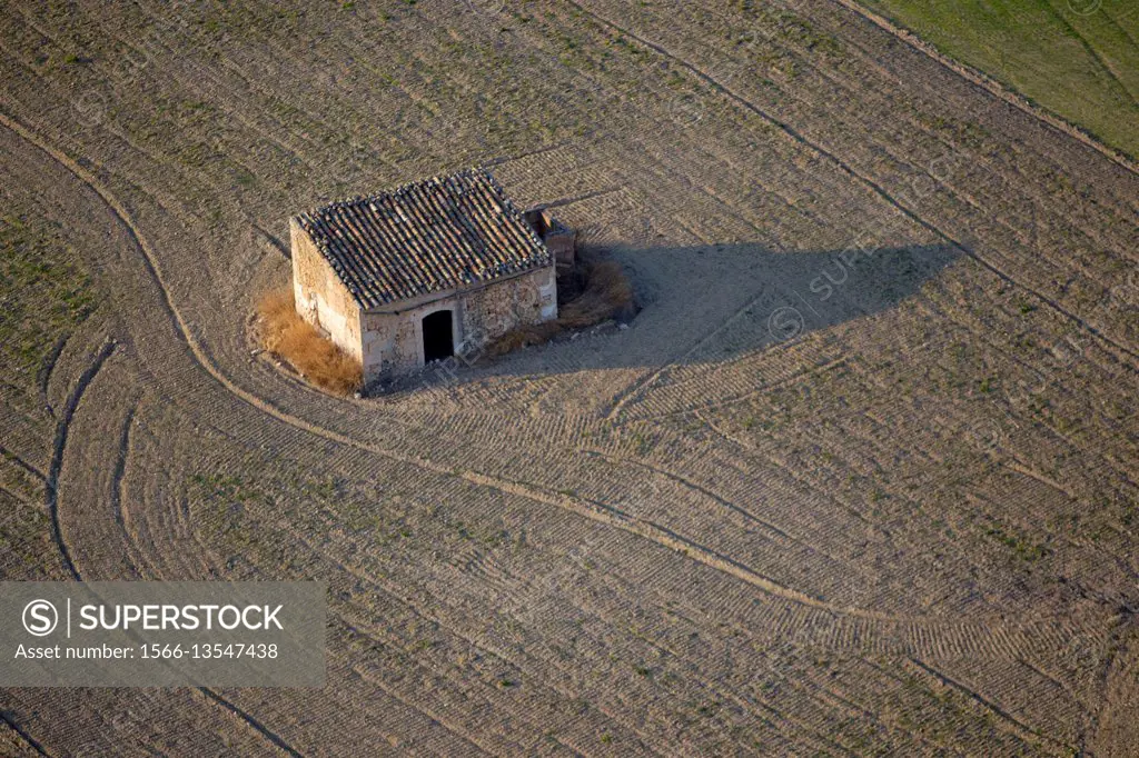 Aerial view of a small country house, Mallorca field, Balearic Islands, Spain.