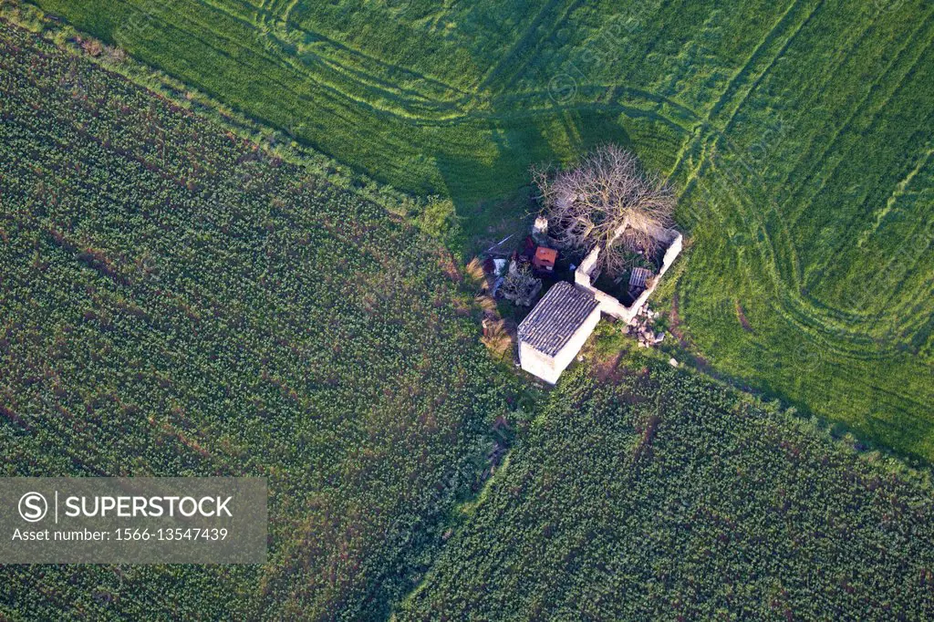 Aerial view of a small old house, Mallorca lands, Balearic Island, Spain.