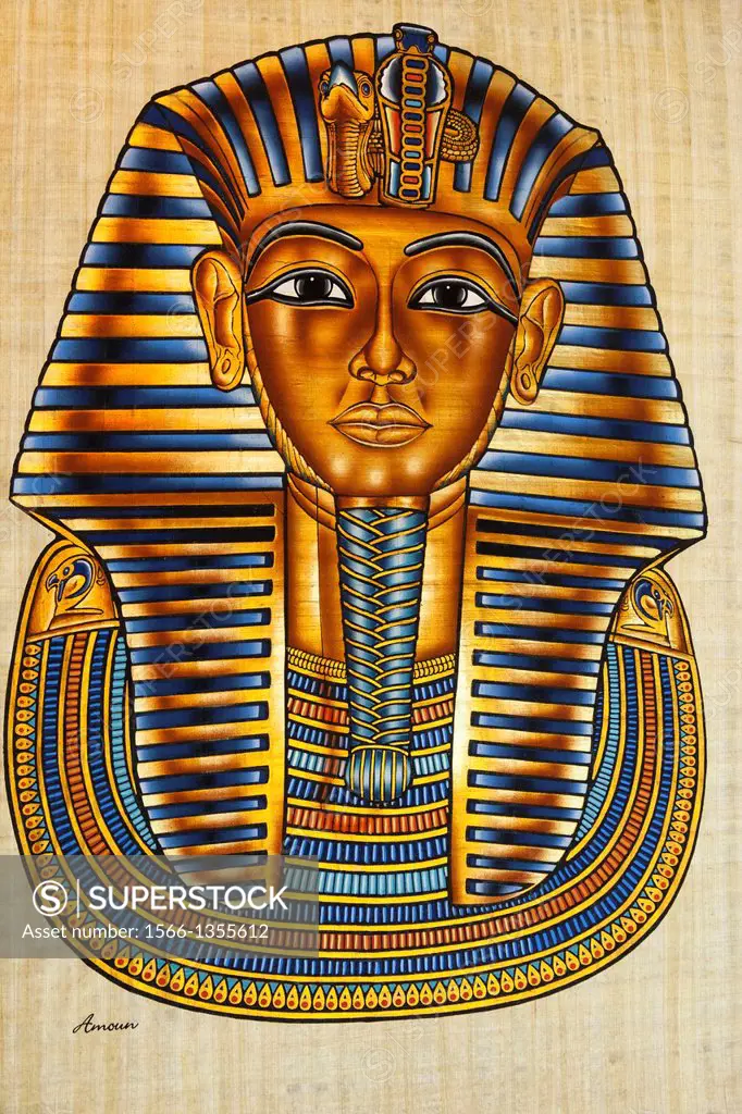 Painting of Tutankhamun's death mask on papyrus paper, Cairo, Egypt.