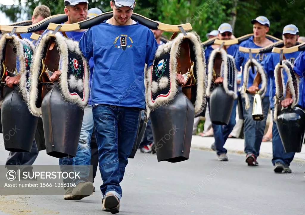 Parade of men playing with traditional Swiss cowbells, Nendaz, canton Valais, canton Wallis, Switzerland.