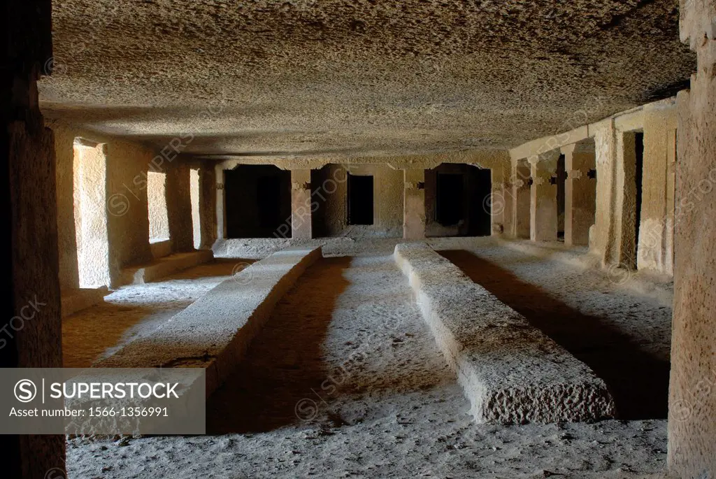Cave 11, Kanheri Caves Mumbai. Interior view of the hall. The Kanheri Caves constitute a group of rock-cut monuments. The Kanheri Caves demonstrate th...