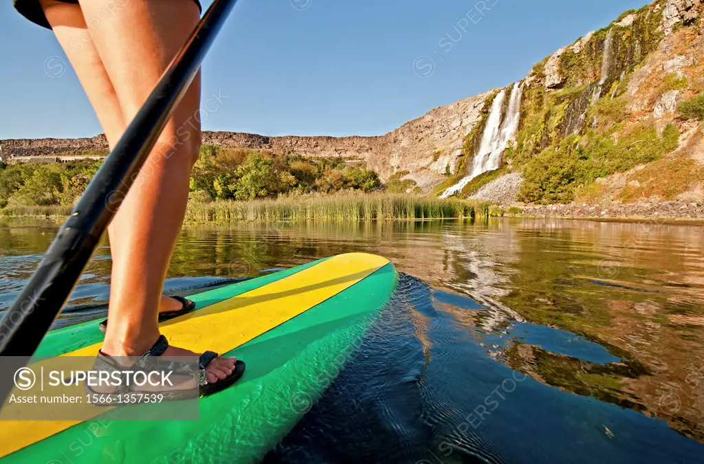 Riding the Standup Paddle Board at Thousand Springs in the Snake River Canyon near the city of Hagerman in southern Idaho.