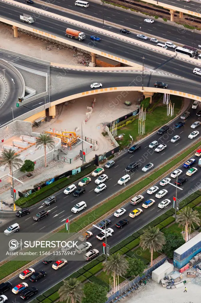 UAE, Dubai, Downtown Dubai, Dubai Mall, elevated view of traffic by the Dubai Mall.