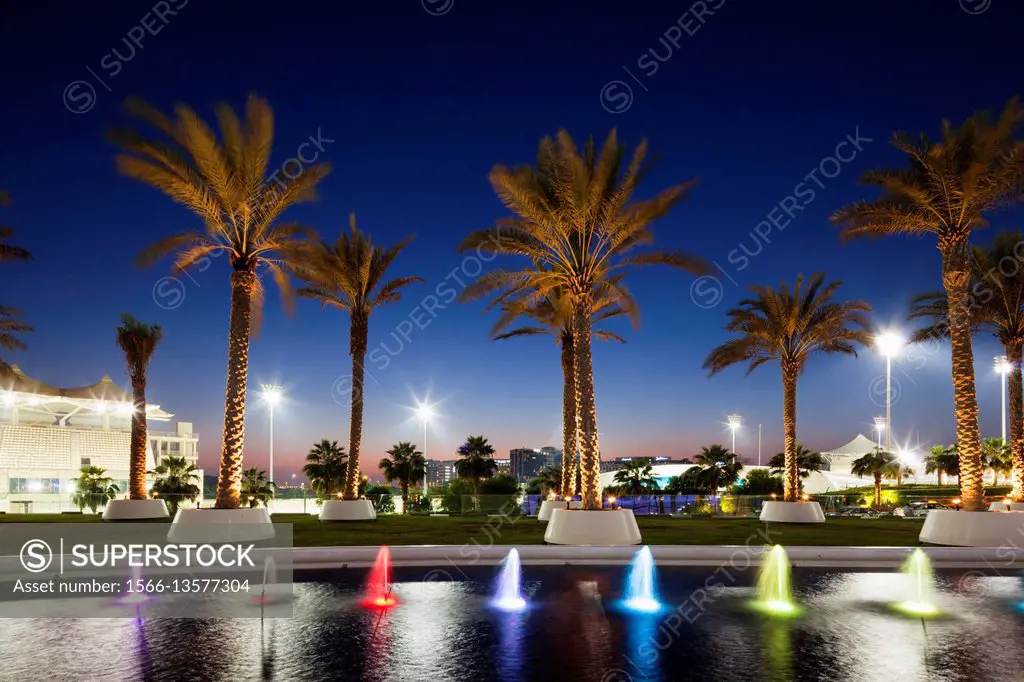 UAE, Abu Dhabi, Yas Island, Yas Marina Formula One Circuit racetrack grandstand and fountains.