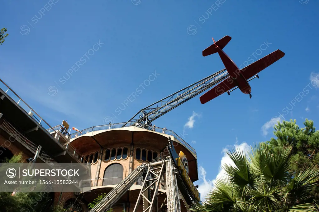Airplane carousel in Tibidabo Amusement Park, Tibidabo, Barcelona, Spain. The Tibidabo theme park, Barcelona, Spain. Tibidabo is a mountain overlookin...