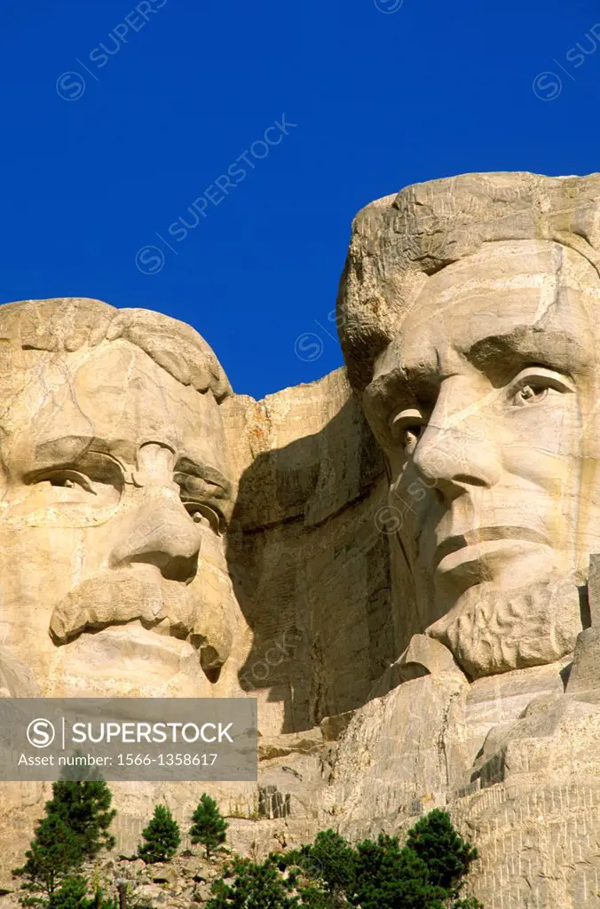 Morning light on Roosevelt and Lincoln faces on Mount Rushmore, Mount Rushmore National Memorial, South Dakota.