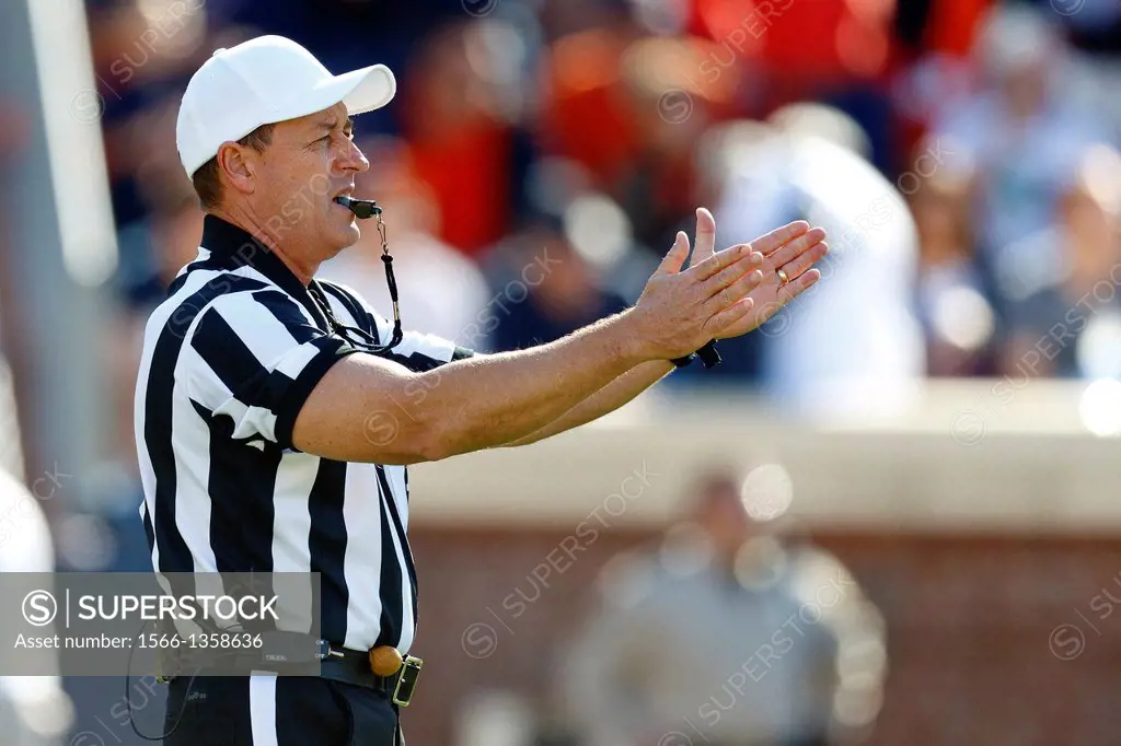 Oct 15, 2011; Charlottesville VA, USA; NCAA referee David Epperley during the first quarter between the Virginia Cavaliers and the Georgia Tech Yellow...