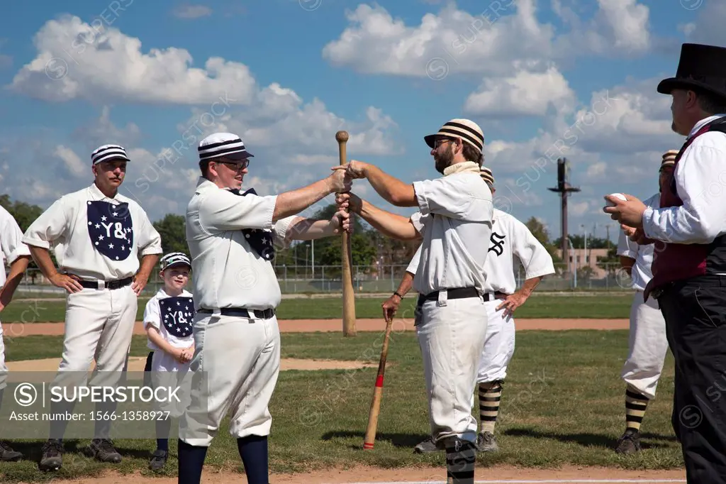 Detroit, Michigan - Players compete for first bats before a vintage base ball game between the Wyandotte Stars and the Saginaw Old Golds. The teams pl...