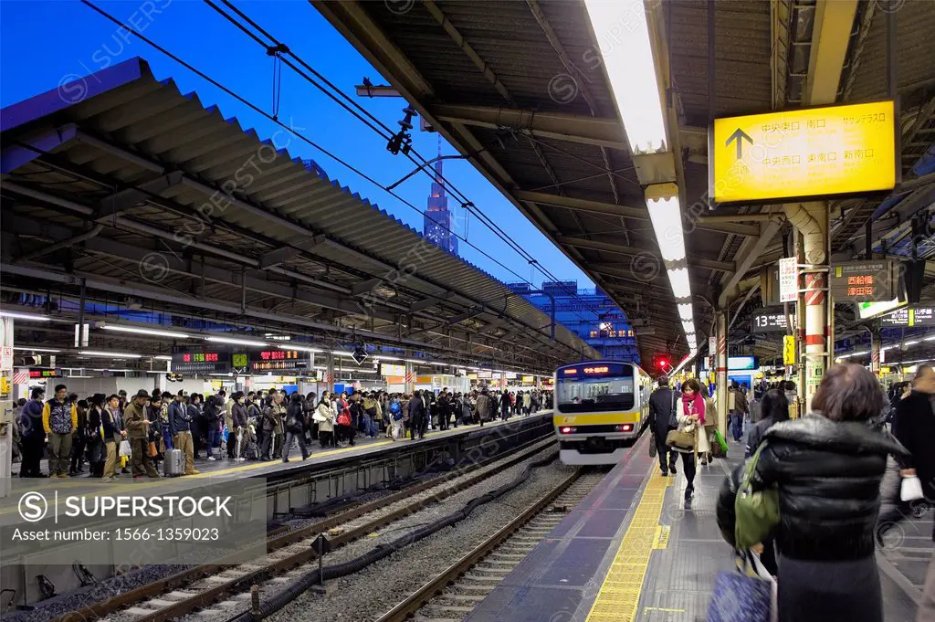 Shinjuku Railway station.Yamanote Line. In background NTT DoCoMo Yoyogi Building, Shinjuku, Tokyo, Japan.