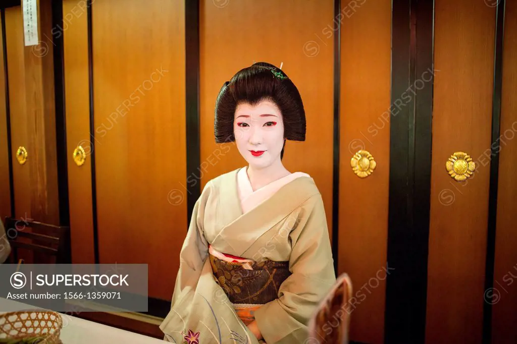 Geishas and clients in Ochaya (tea house).Geisha´s distric of Kamishichiken .Kyoto. Kansai, Japan.