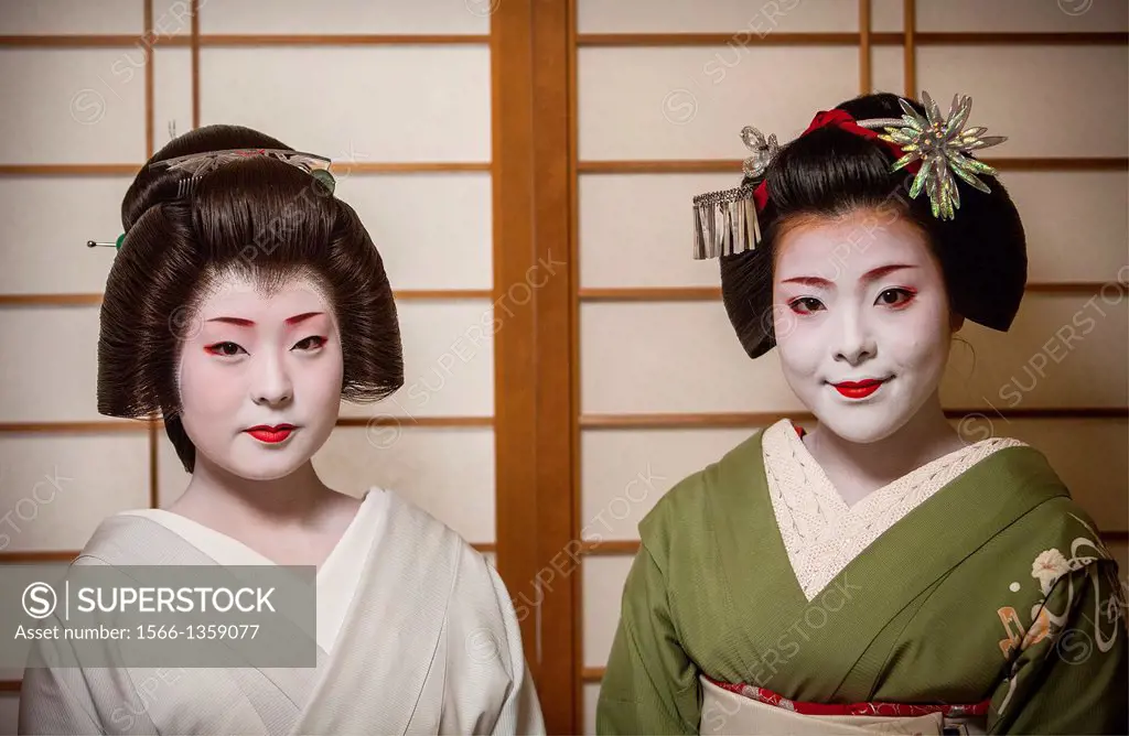 Fukuyu,geisha and Fukukimi,´maiko´ (geisha apprentice). from Ishihatsu okiya (geisha house).Geisha´s distric of Miyagawacho.Kyoto. Kansai, Japan.