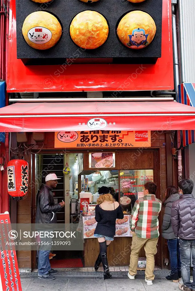 tako-yaki stall, octopus balls stall,next to Mitsu Koen Park or Triangle Park,America Mura,Osaka, Japan,Asia.