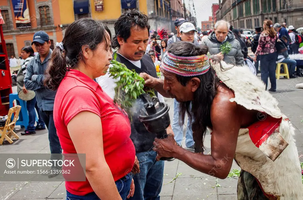 Aztec folk healer, shaman practising spiritual cleansing,Plaza de la Constitución, El Zocola, Zocola Square, Mexico City, Mexico.