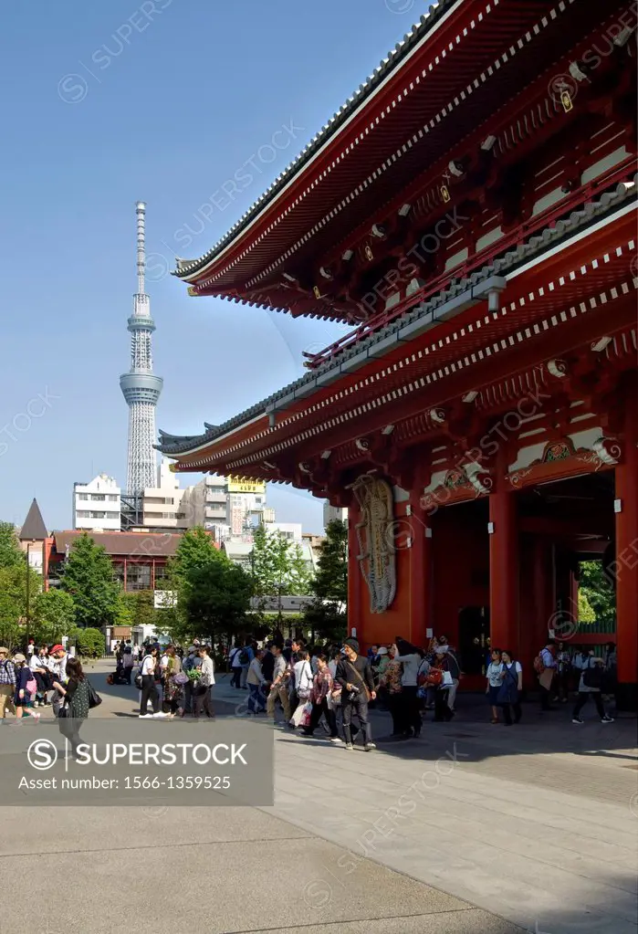 Sensoji temple, Kannon temple, Asakusa, Tokyo, Main gateway to Temple, Tourists, Locals, Sky Tree in Background.