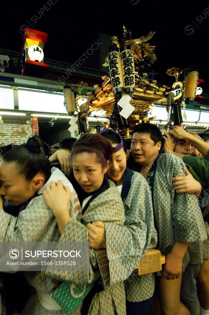 Asakusa, Tokyo, Japan, May, Sanja Matsuri, Sanja Festival, Three day, day and night festival, Traditional costumes, Men and women carrying portable sh...