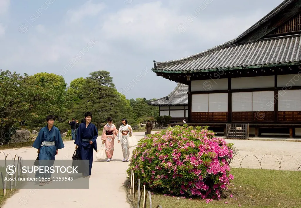 Nijo Castle, Ninomaru Palace grounds, Example of early 17th. century architecture, Momoyama period, Shogun's Kyoto residence, Young Japanese in kimono...