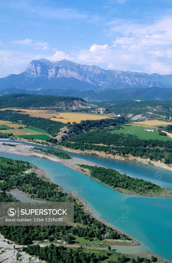 Aerial view of Rio Cinca river near Ainsa and back Sierra Ferrera, Aragon, Spain.