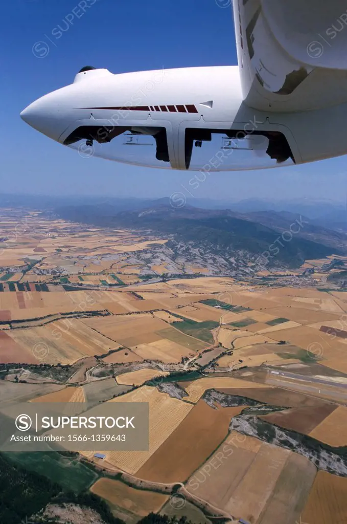Glider plane Twin Astir in aerobatic flight near Santa Cilia de Jaca, Aragon, Spain.