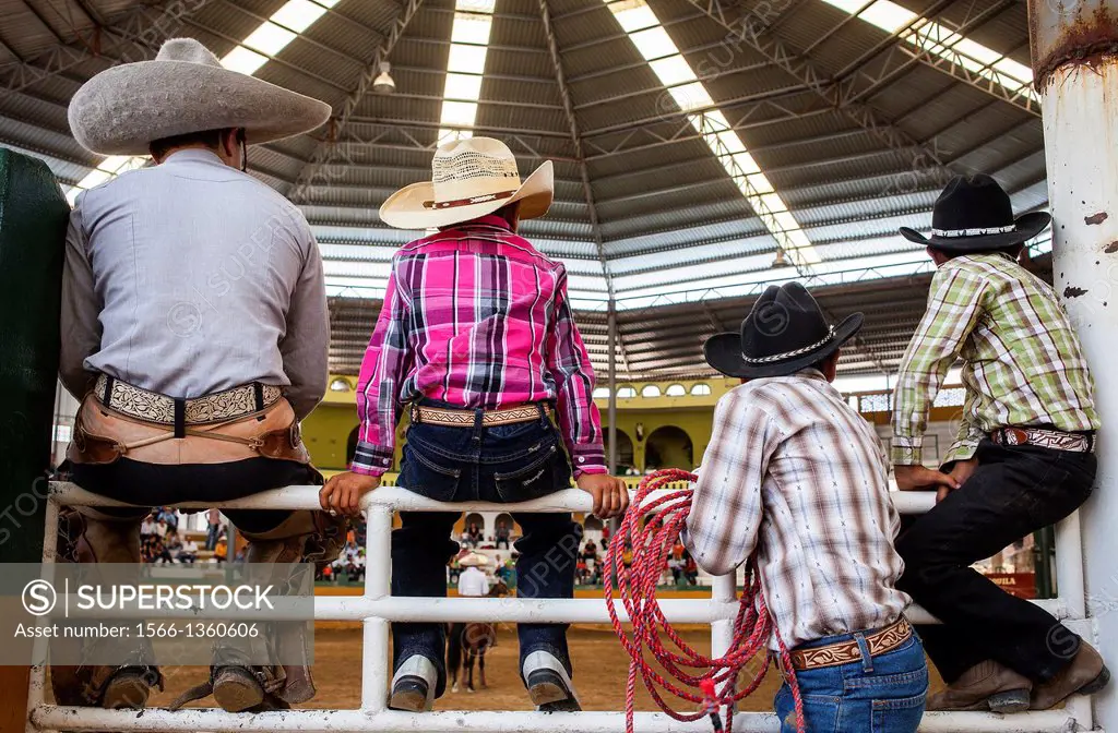 Spectators watch a charreada Mexican rodeo at the Lienzo Charro Zermeno, Guadalajara, Jalisco, Mexico.