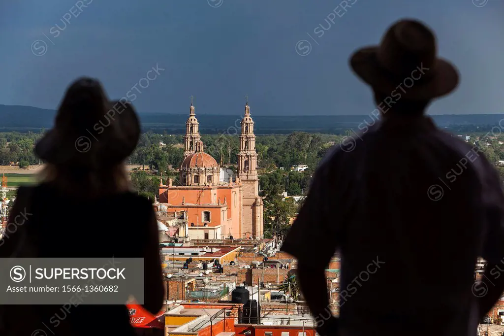 View from `El Calvario´.Couple, in background Parroquia de la Asunción de María, Lagos de Moreno, Jalisco, Mexico.
