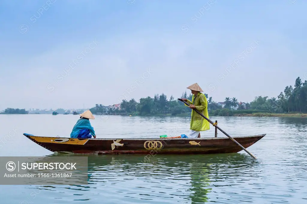 Fishing boats in the Thu Bon River near Hoi An, Vietnam, Asia.