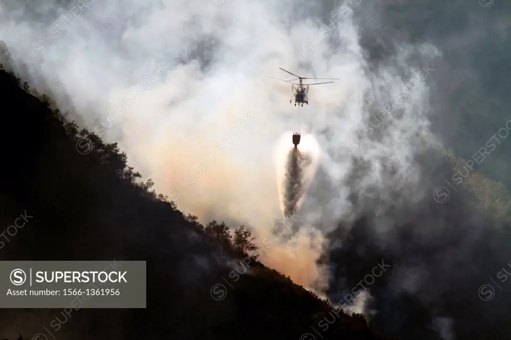 August 2013 Lugo Fire in Navia, in Ancares, Natura protected area, Biosphere and reserba. It affects more than 500 hectares of forest. Aerial and terr...