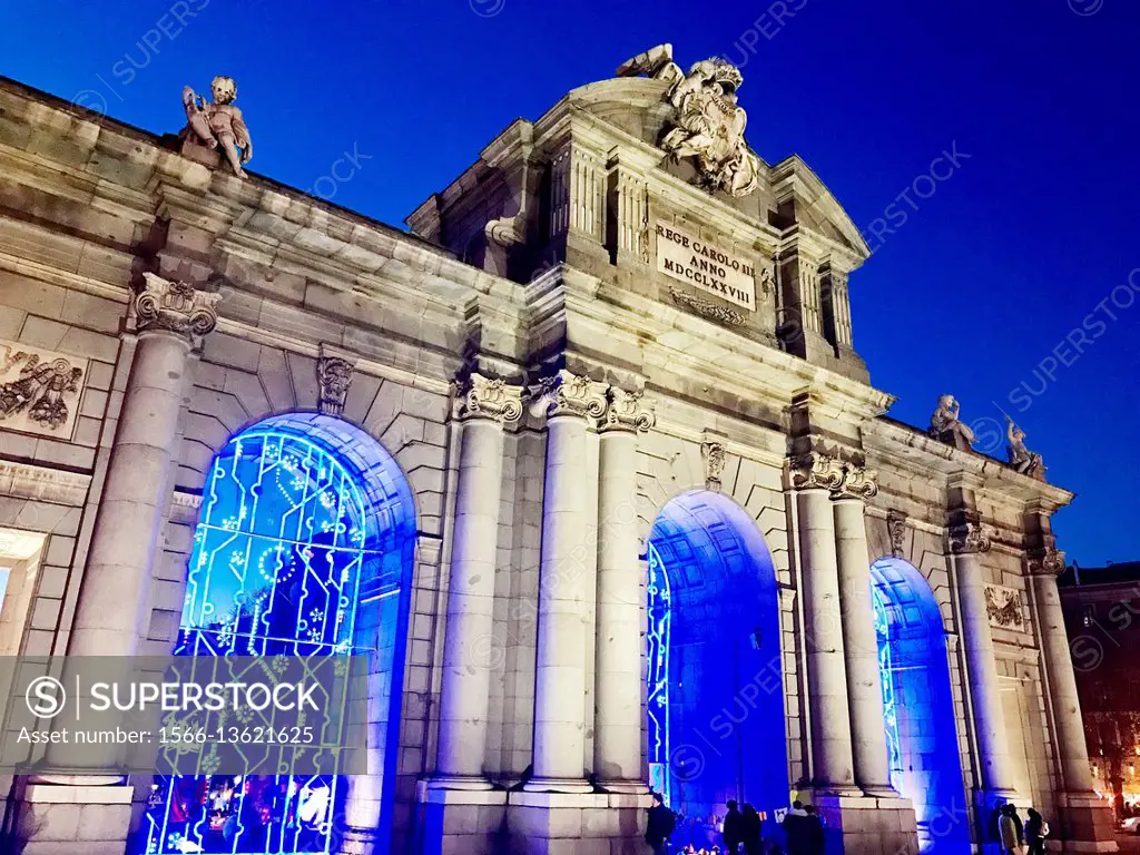 Puerta de Alcala at Christmas time, night view. Independencia Square, Madrid, Spain.