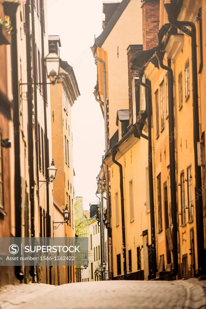 City scene with old buildings in narrow alley in Stockholm, capital of Sweden.