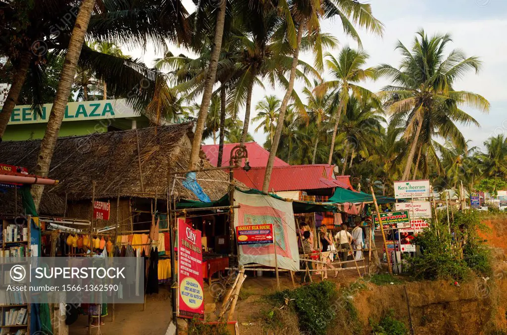 Souvenir shops and restaurants on Varkala beach, Kerala, South India.