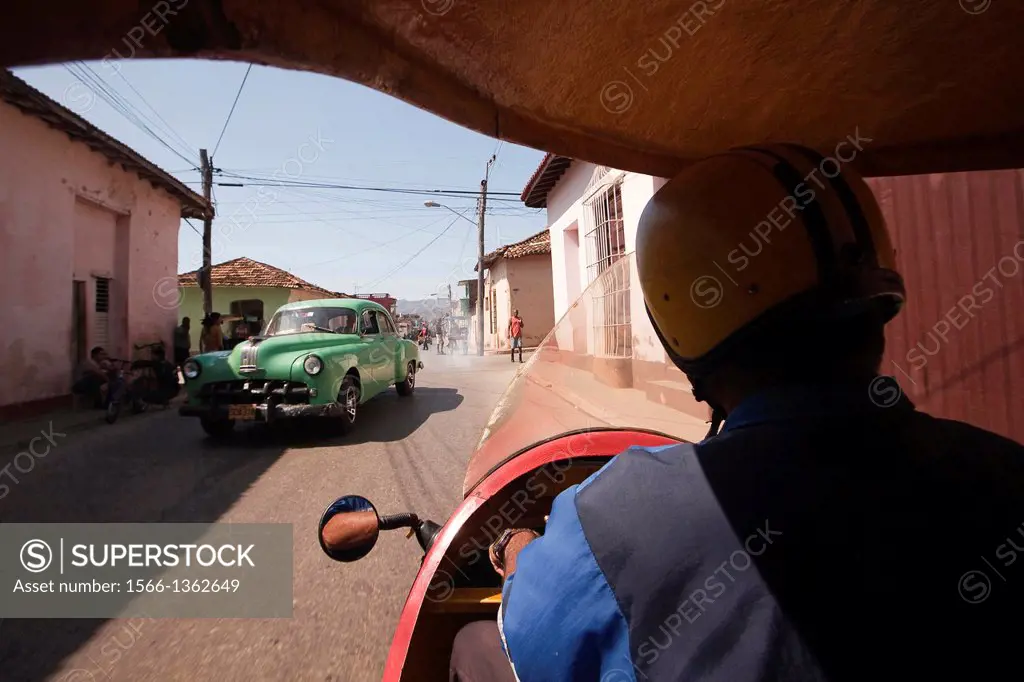 Coco taxi entering into the Trinidad town, Trinidad, Sancti Spritus, Cuba.