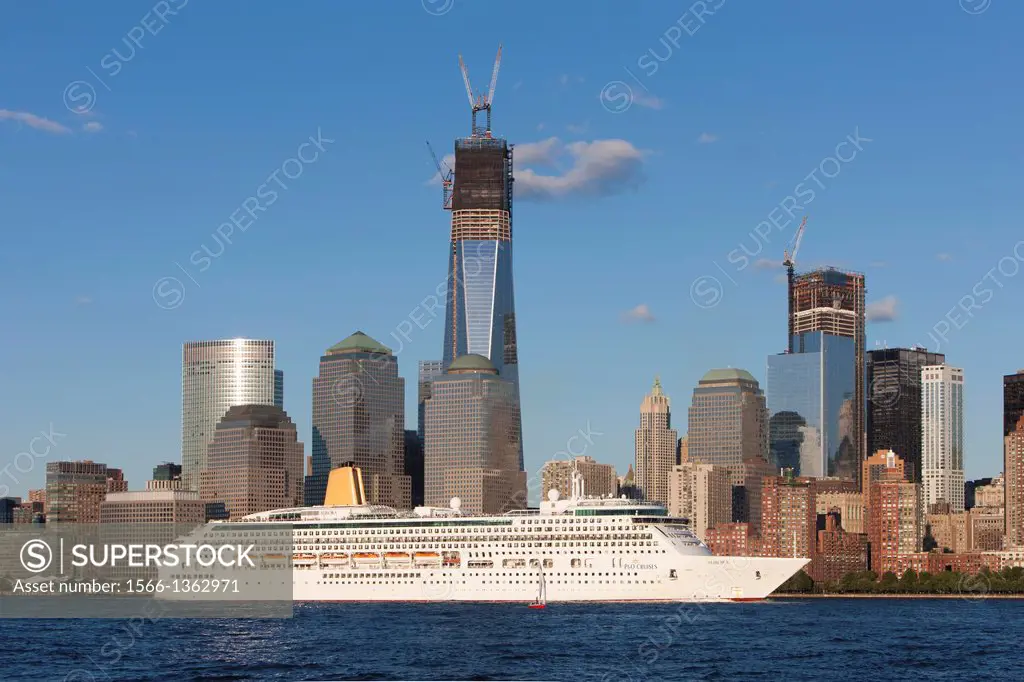 PO Cruises cruise ship Aurora heads south on the Hudson River past the rising Freedom Tower and the lower Manhattan skyline.