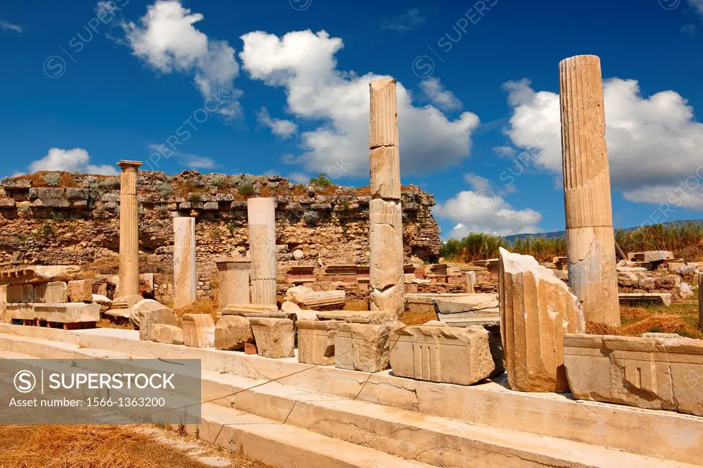 Columns aropund the the sanctuary of Artimis with the Agora, Magnesia on the Meander arcaeological site, Turkey.