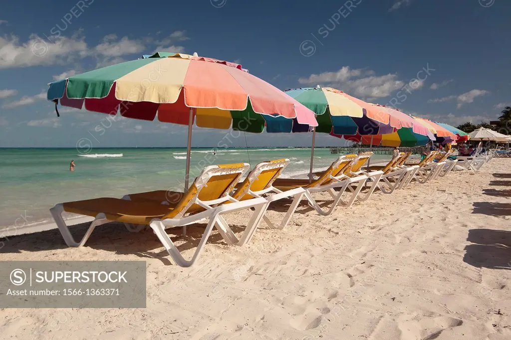 Parasols and sunbeds at the beach, Isla Mujeres, Cancun, Quintana Roo, Yucatan Province, Mexico.