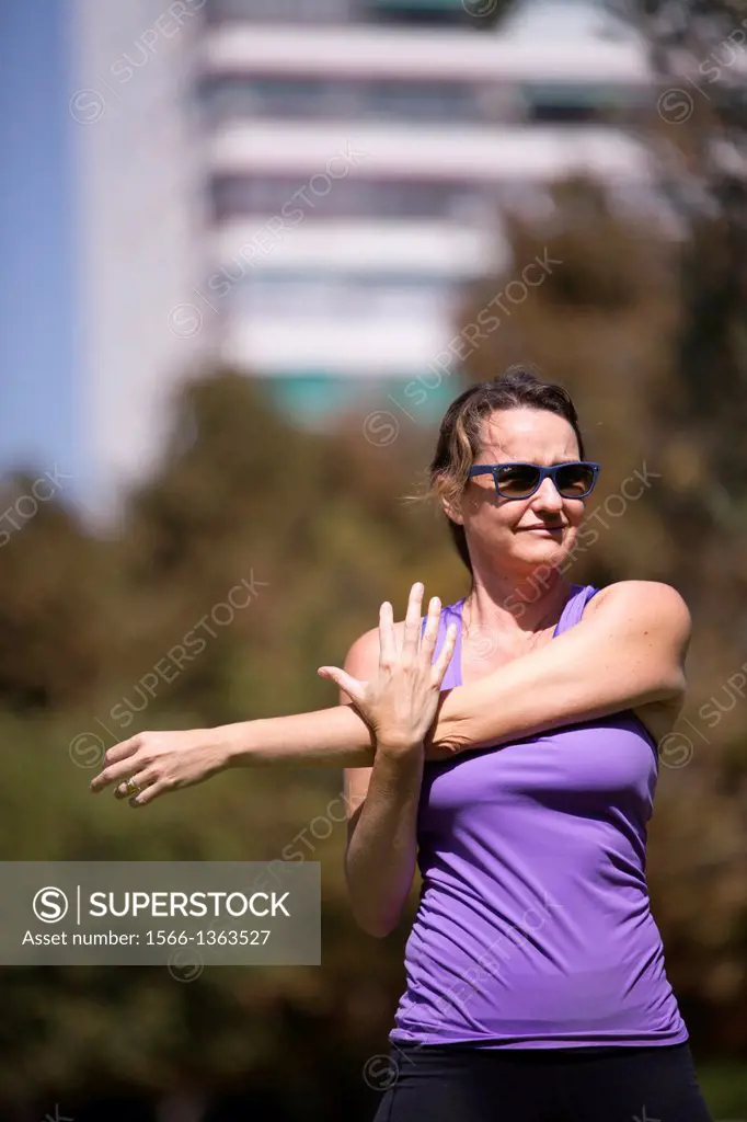 Woman doing workout outdoors.
