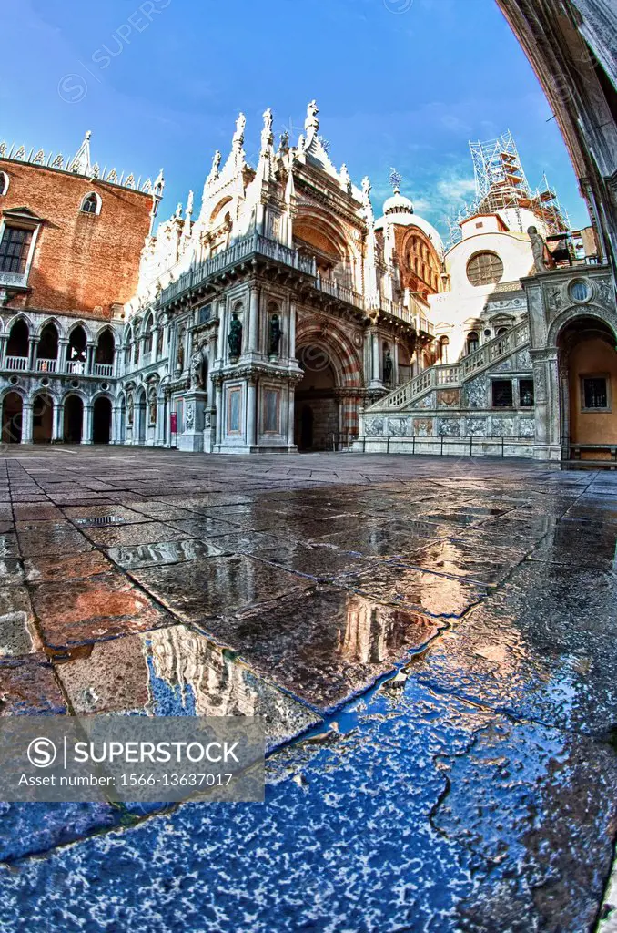The magnificent Doge's Palace reflecting in some small pools in its inner court. It is one of the most important buildings in Venice. It was the cente...
