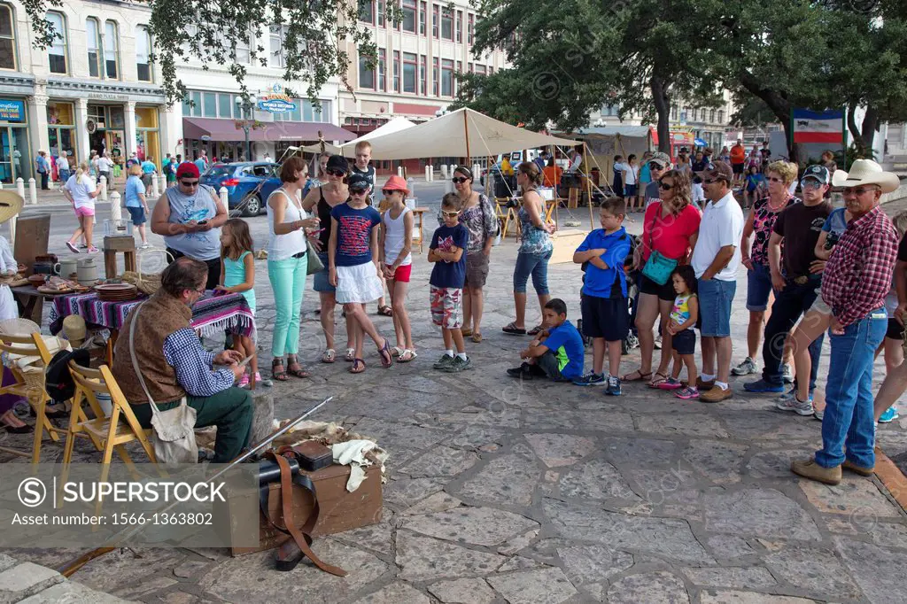 San Antonio, Texas - Members of the San Antonio Living History Association demonstrate life of the 1830s at the plaza in front of the Alamo. The month...