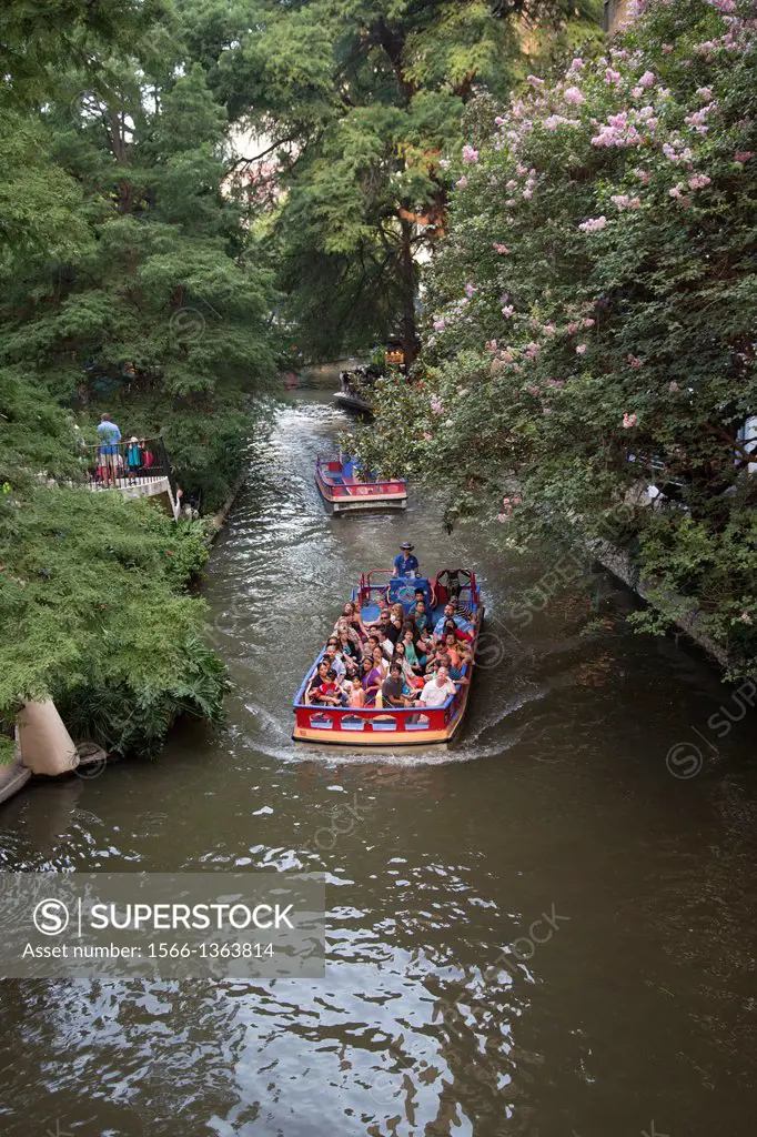 San Antonio, Texas - Tourist boats on the San Antonio River along the Riverwalk.