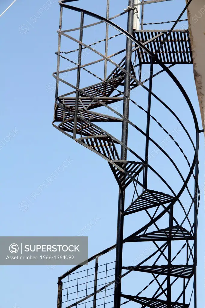 metal steel spiral stairs by property in parga greece.
