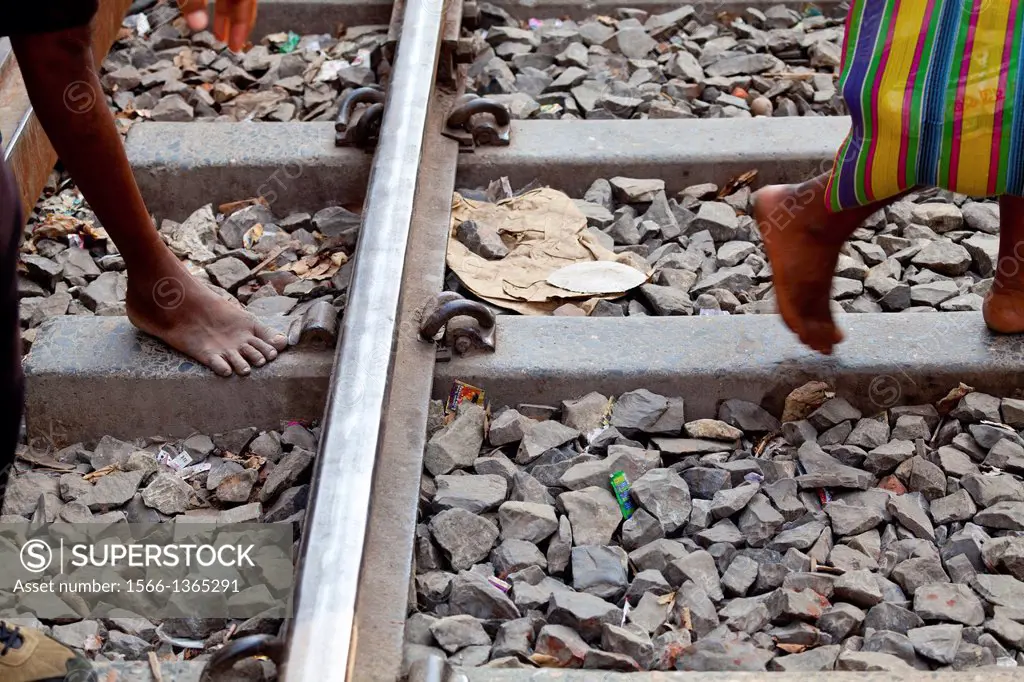 Crossing Railway Tracks in Kolkata, India.