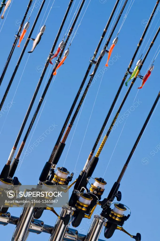Fishing poles with lures on ocean charter fishing boat, Oregon.