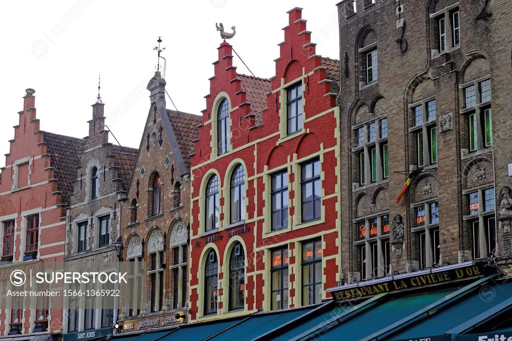 Bruges Belgium Flanders Europe Brugge gabled guild houses in Market Square converted to restaurants.