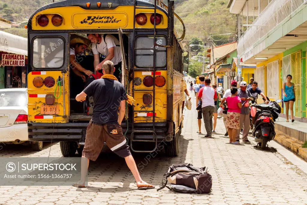 Backpackers getting on the bus of San Juan del Sur, Nicaragua